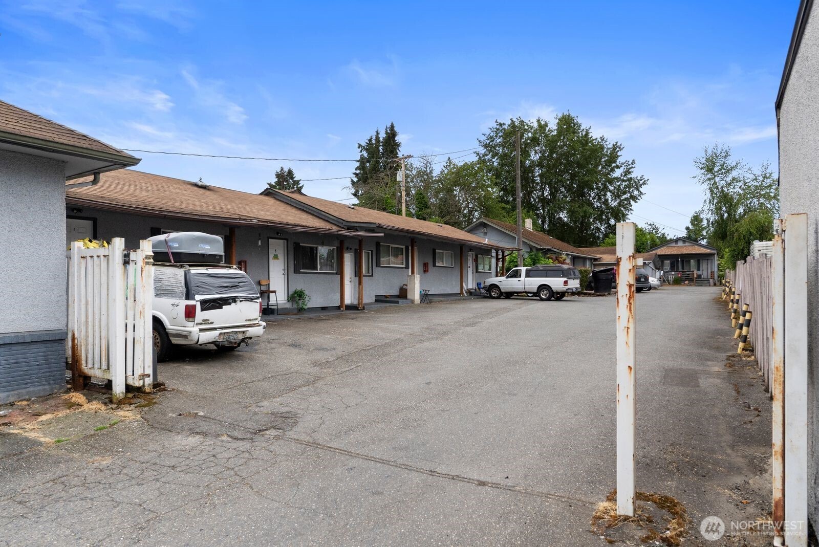 9618 Pacific Avenue Tacoma, WA 98444 - Photo 4 of 14 a view of a car park in front of house