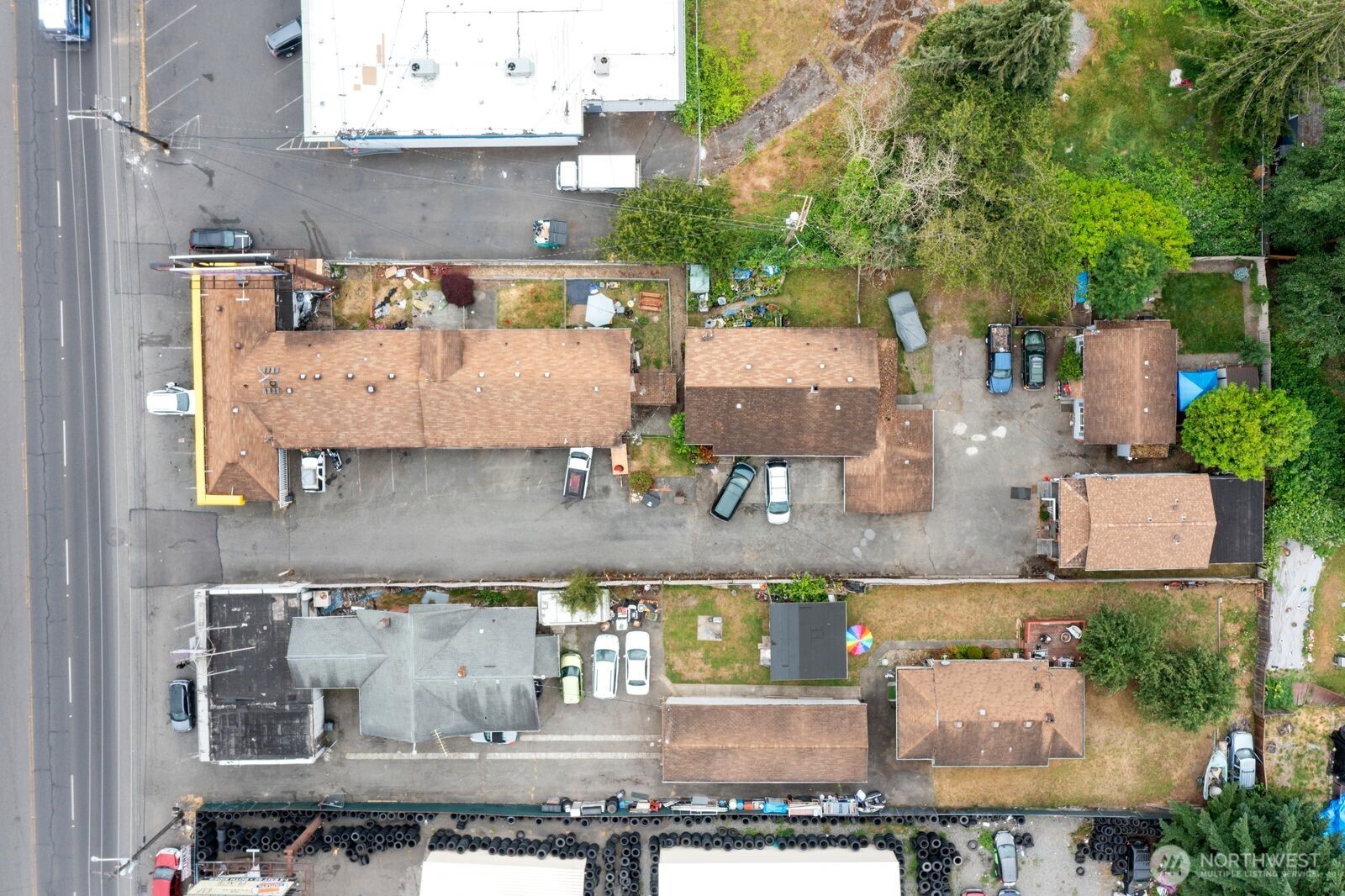 9618 Pacific Avenue Tacoma, WA 98444 - Photo 7 of 14 an aerial view of a house with a swimming pool