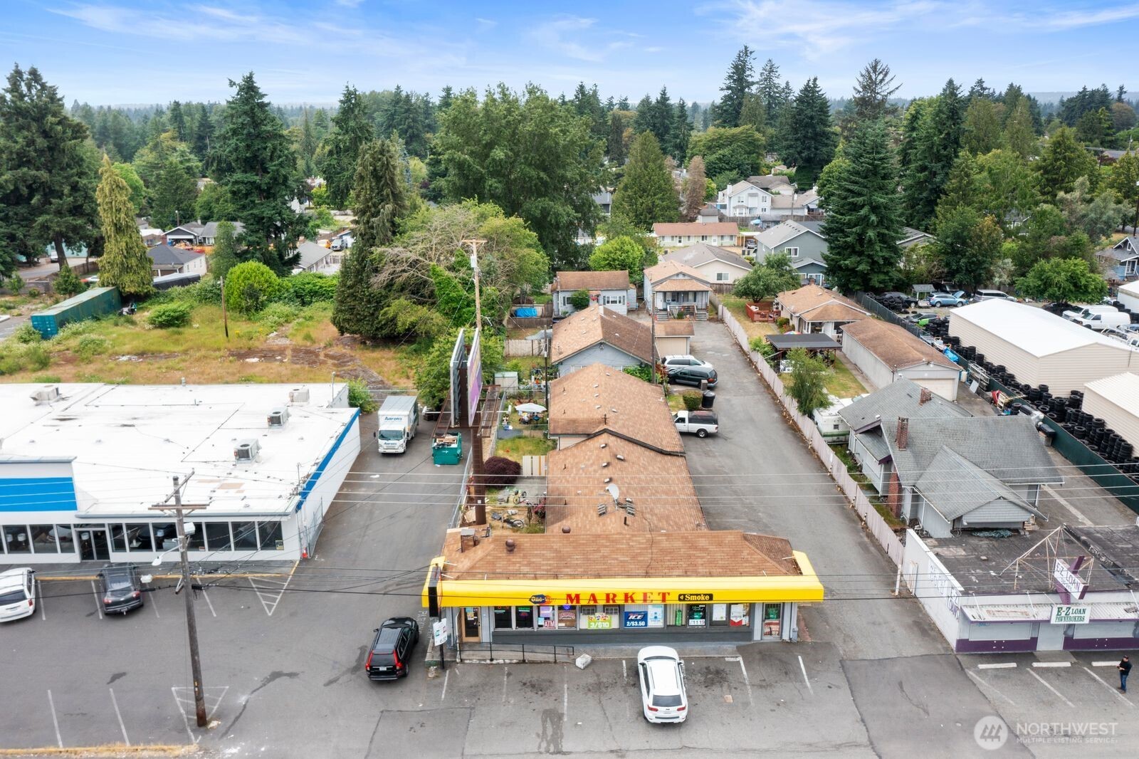 9618 Pacific Avenue Tacoma, WA 98444 - Photo 8 of 14 an aerial view of a city