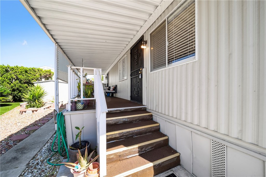 4101 Paramount Boulevard, Unit 27 Pico Rivera, CA 90660 - Photo 5 of 22 a view of entryway with patio