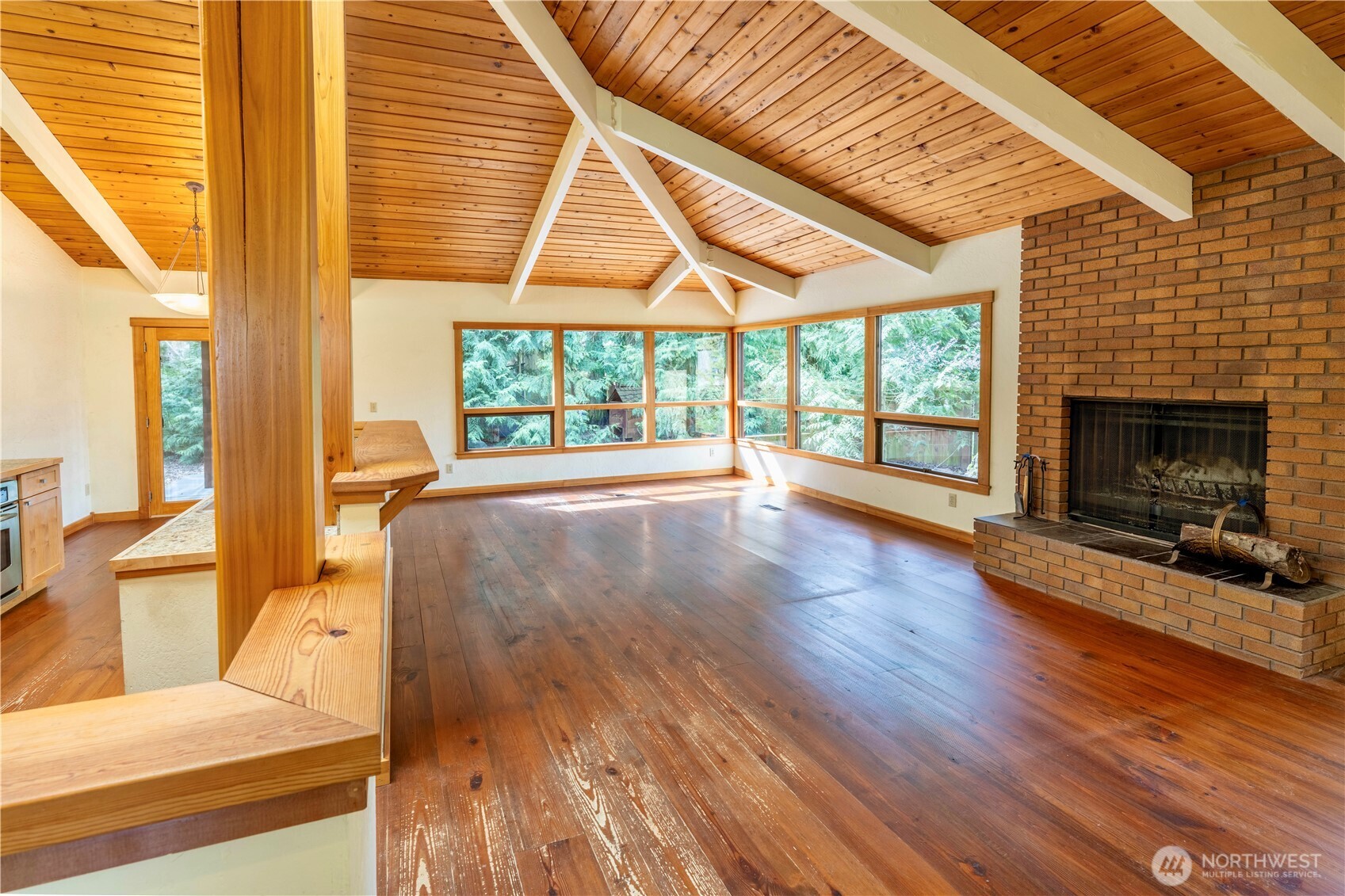 182 Sunset Place Sequim, WA 98382 - Photo 6 of 18 a view of a living room with furniture and a fireplace
