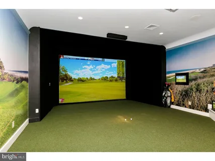 a view of a patio with a table and chairs