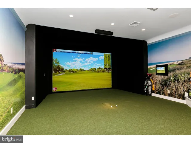 a view of a patio with a table and chairs