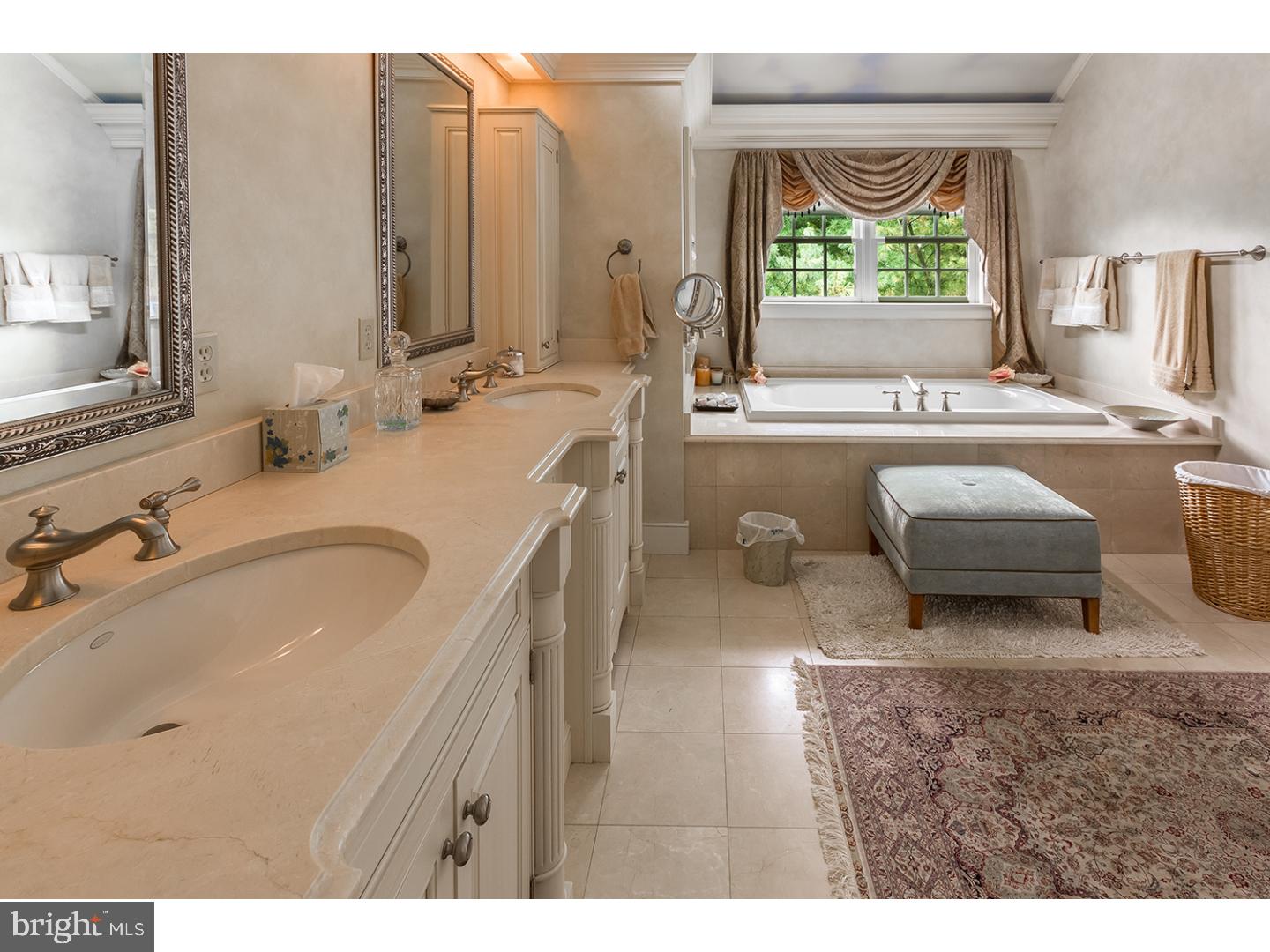 628 Windsock Way Moorestown, NJ 08057 - Photo 28 of 50 a bathroom with a granite countertop sink and a large mirror
