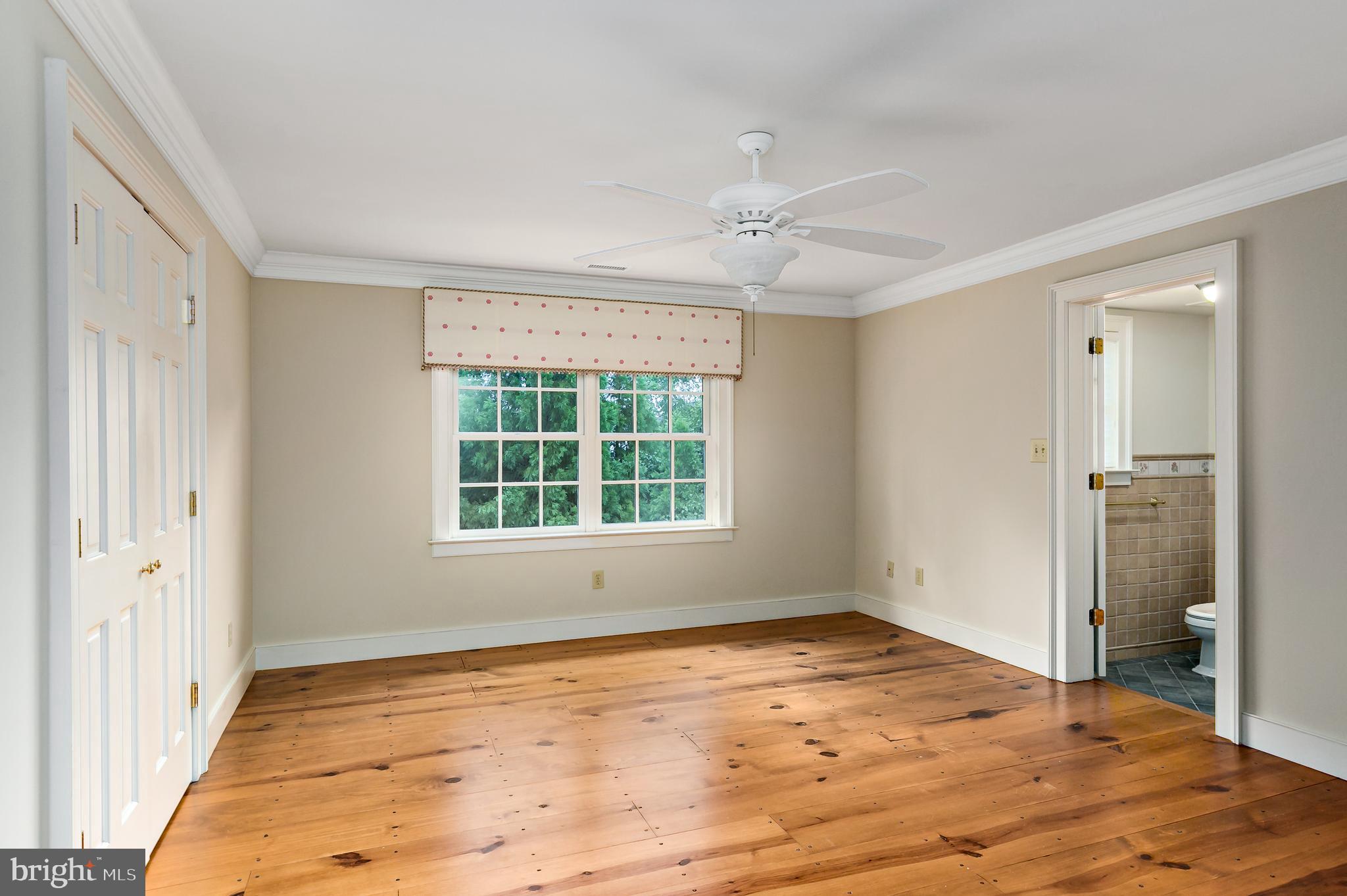 628 Windsock Way Moorestown, NJ 08057 - Photo 31 of 50 a view of an empty room with wooden floor and a window