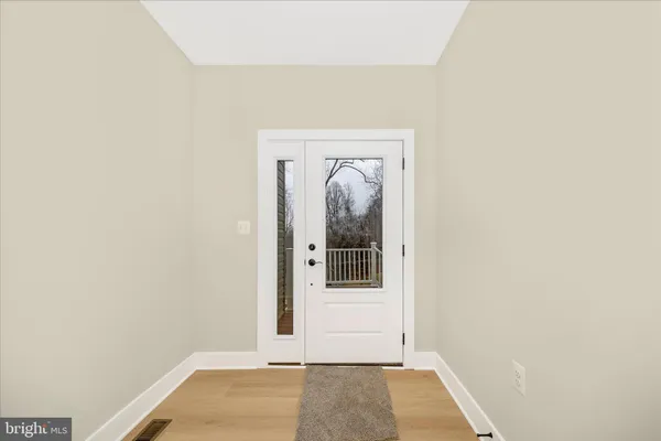 a view of a room that has a window