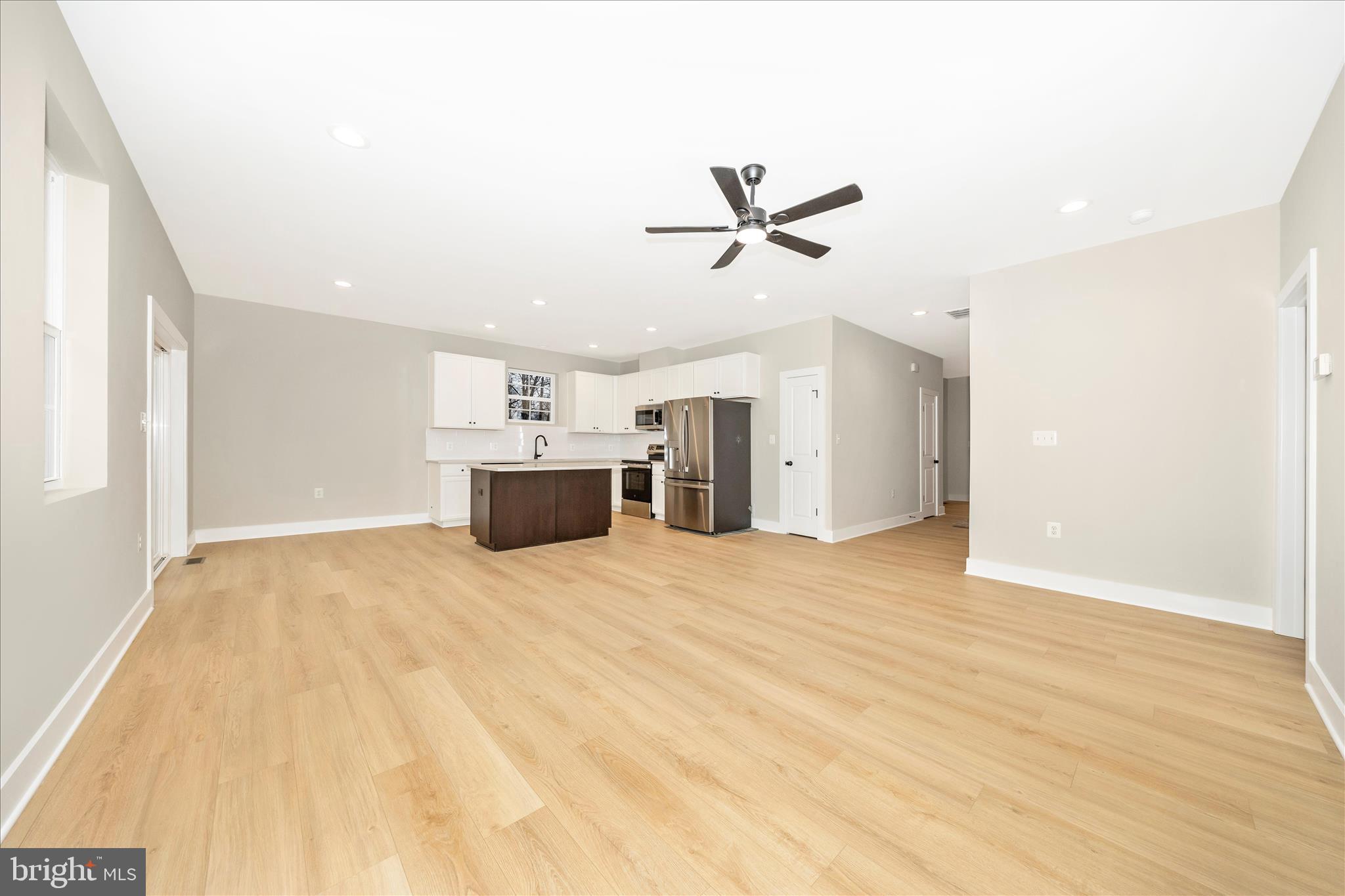 7816 Fairplay Road Fairplay, MD 21733 - Photo 22 of 34 a view of empty room with wooden floor and ceiling fan