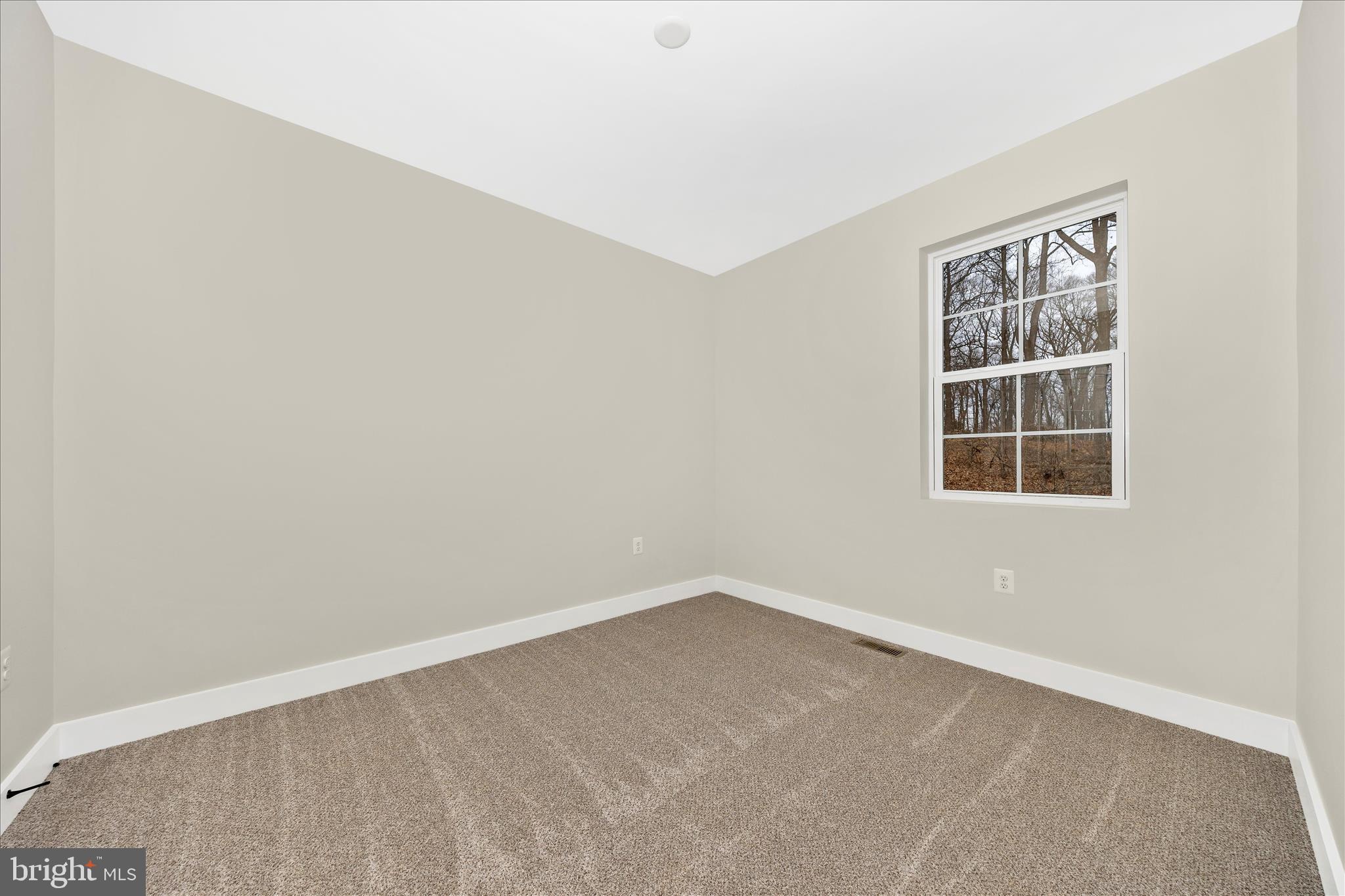7816 Fairplay Road Fairplay, MD 21733 - Photo 9 of 34 an empty room with a window