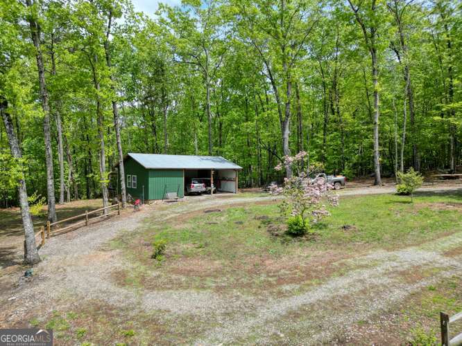 478 Flat Top Road, Unit 6 Young Harris, GA 30582 - Photo 12 of 70 a front view of a house with garden