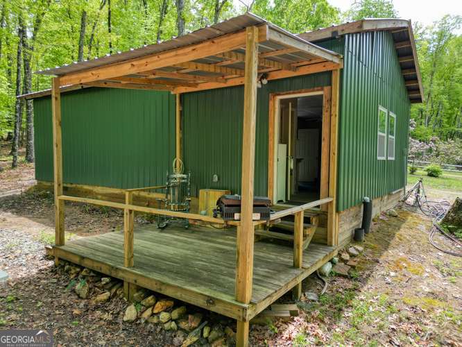 478 Flat Top Road, Unit 6 Young Harris, GA 30582 - Photo 18 of 70 a backyard of a house with seating space