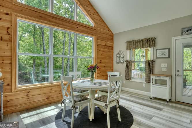 478 Flat Top Road, Unit 6 Young Harris, GA 30582 - Photo 44 of 70 a view of a dining room with furniture window and wooden floor