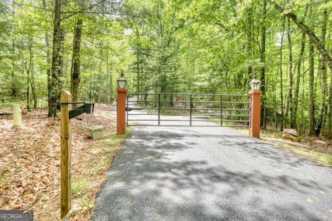 478 Flat Top Road, Unit 6 Young Harris, GA 30582 - Photo 59 of 70 a view of a yard with plants and tree