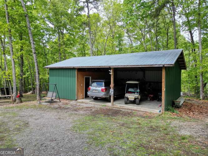 478 Flat Top Road, Unit 6 Young Harris, GA 30582 - Photo 6 of 70 a view of a house with a car and a car parked