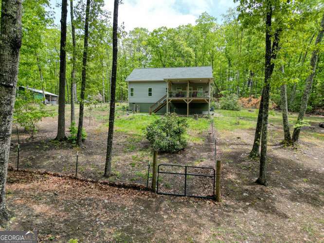 478 Flat Top Road, Unit 6 Young Harris, GA 30582 - Photo 8 of 70 a view of a house with a backyard