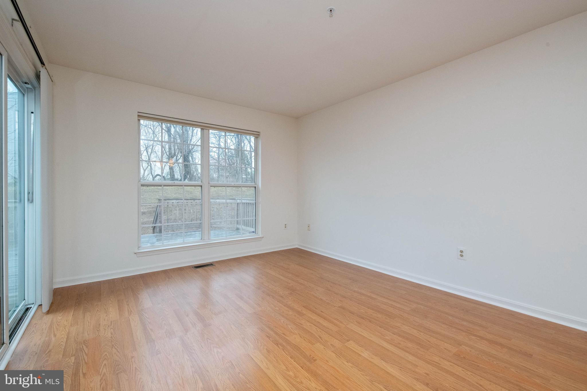 207 Pidco Road Reisterstown, MD 21136 - Photo 14 of 36 Sitting area has sliders to back yard