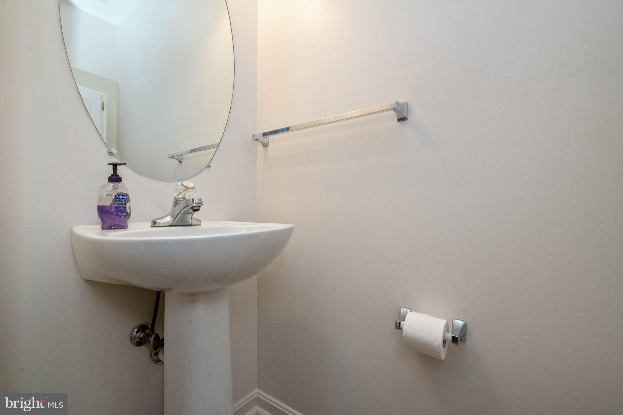 207 Pidco Road Reisterstown, MD 21136 - Photo 16 of 36 Main level powder room with new floors