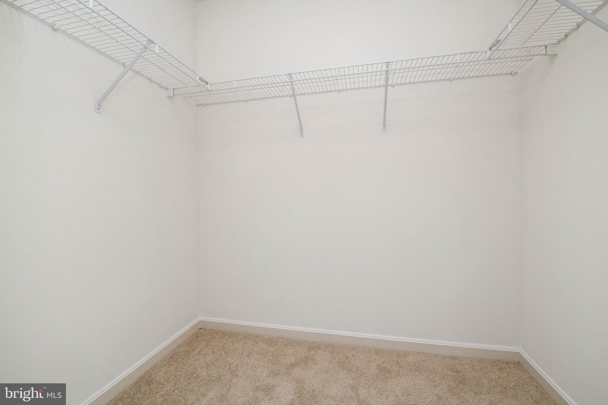 207 Pidco Road Reisterstown, MD 21136 - Photo 21 of 36 Large walk-in closet in master bedroom