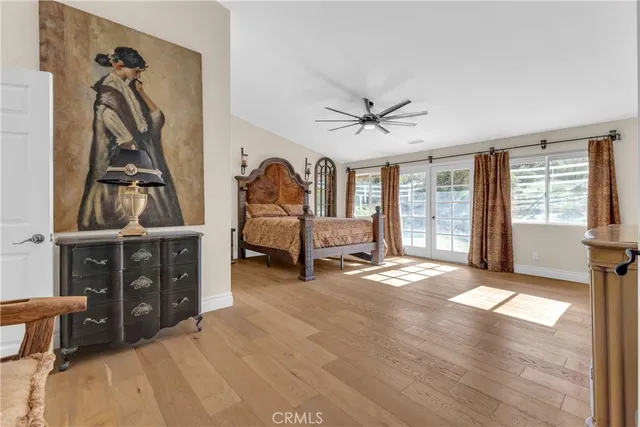 a view of a livingroom with furniture and windows