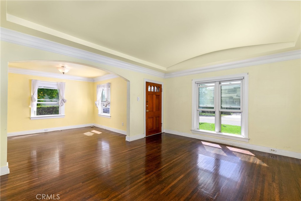 9959 Garibaldi Avenue Arcadia, CA 91007 - Photo 13 of 51 a view of an empty room with wooden floor and a window