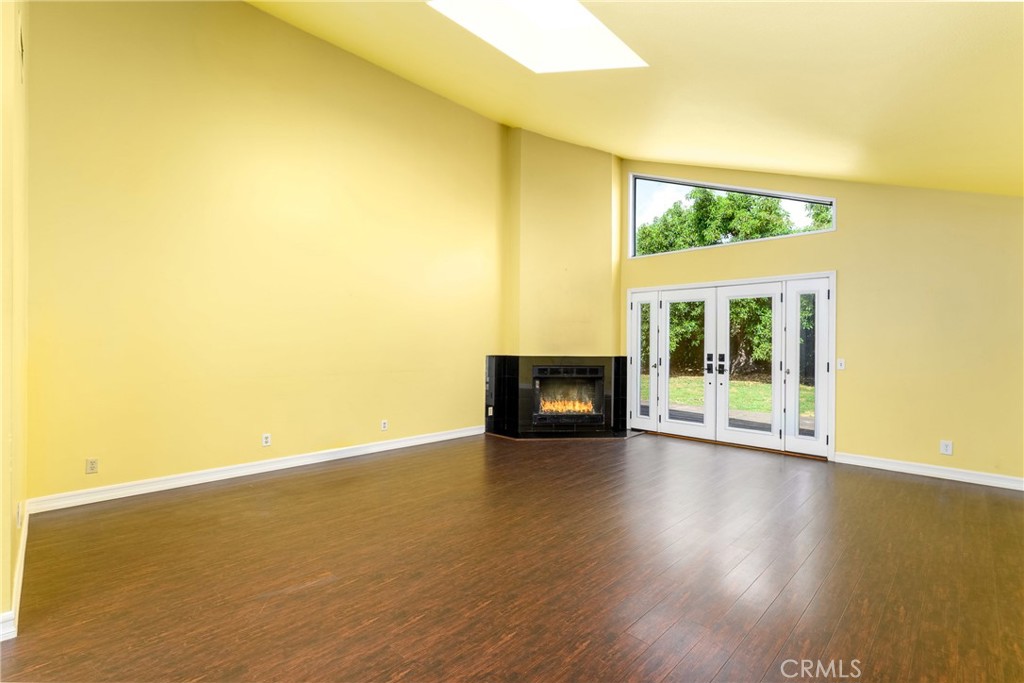9959 Garibaldi Avenue Arcadia, CA 91007 - Photo 24 of 51 a view of an empty room with wooden floor and a window