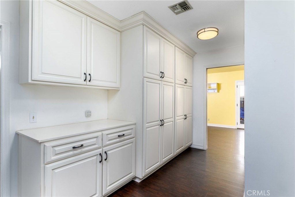 9959 Garibaldi Avenue Arcadia, CA 91007 - Photo 26 of 51 a view of white cabinets and wooden floor