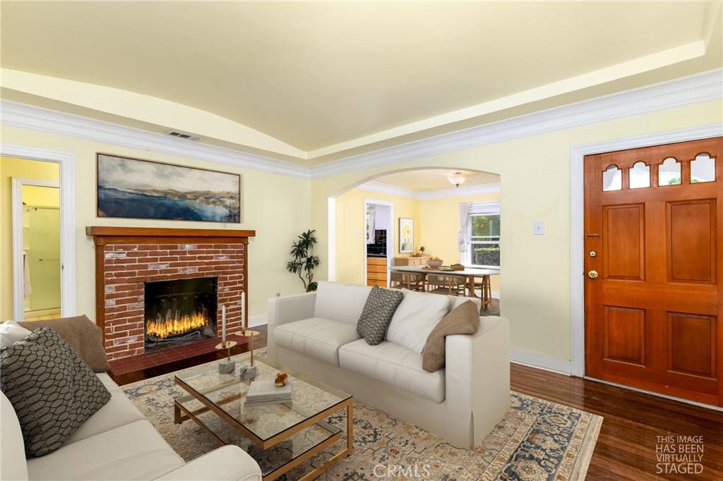 9959 Garibaldi Avenue Arcadia, CA 91007 - Photo 4 of 51 a living room with furniture and a fireplace