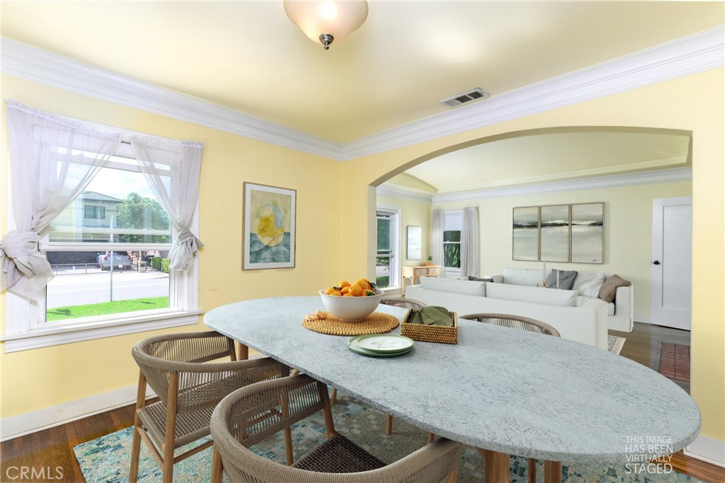 9959 Garibaldi Avenue Arcadia, CA 91007 - Photo 7 of 51 a dining room with furniture wooden floor and a table