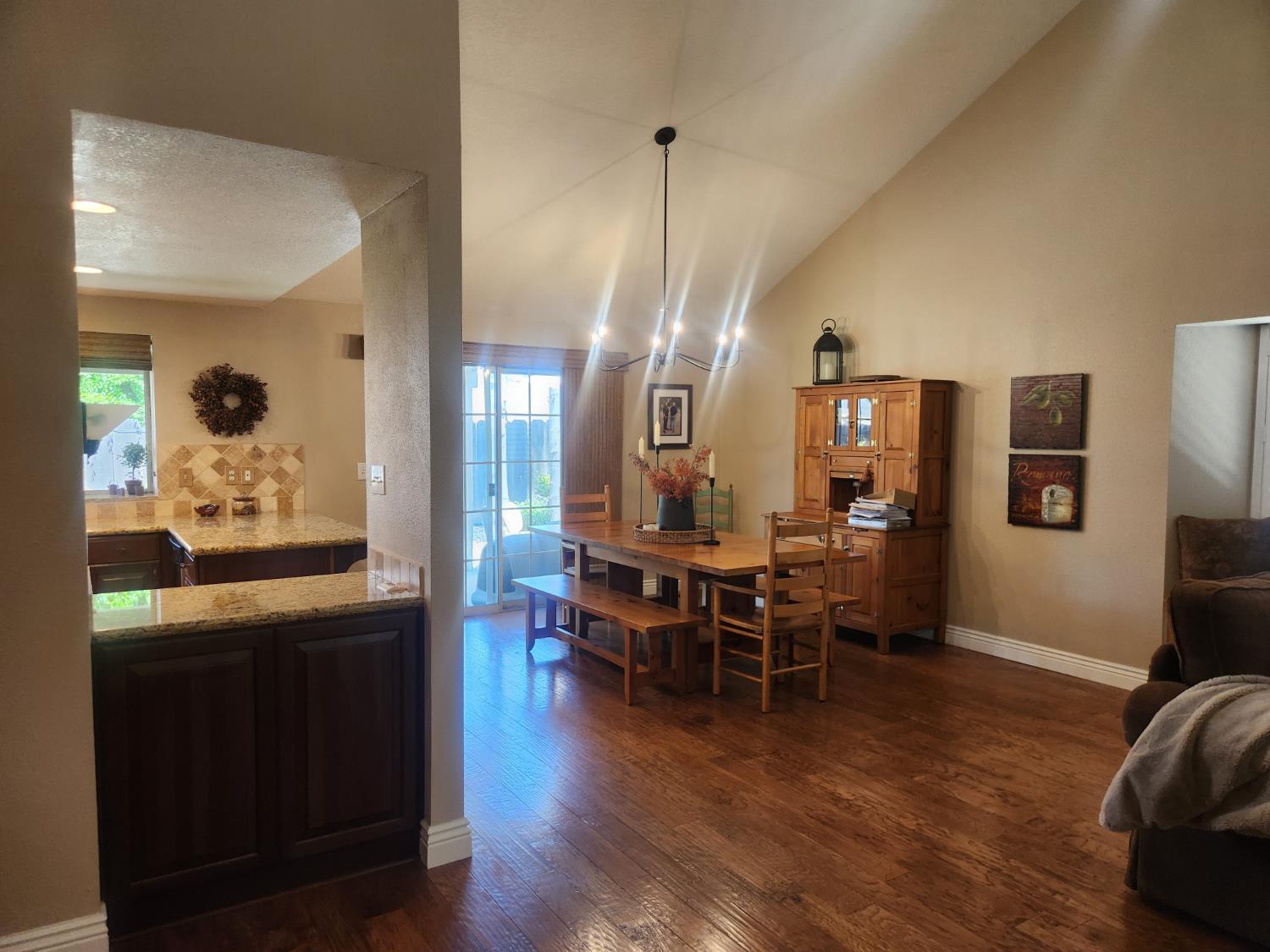 777 Jordanolo Drive Ripon, CA 95366 - Photo 13 of 61 a view of a dining room with furniture and wooden floor