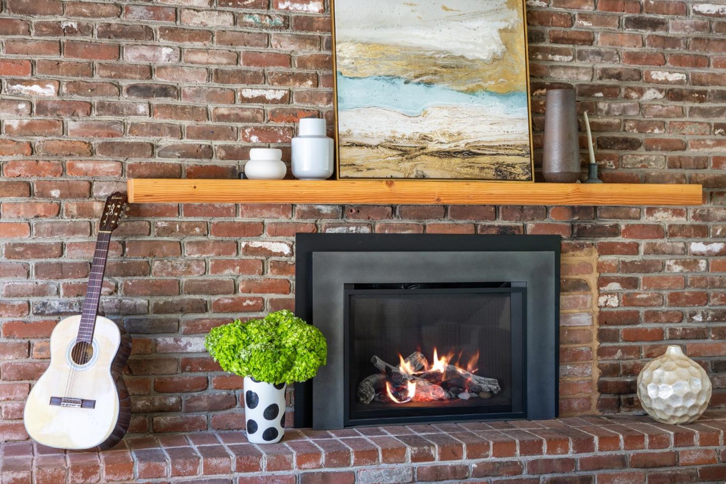25165 Stewart Place Carmel, CA 93923 - Photo 11 of 51 a living room with furniture and a fireplace