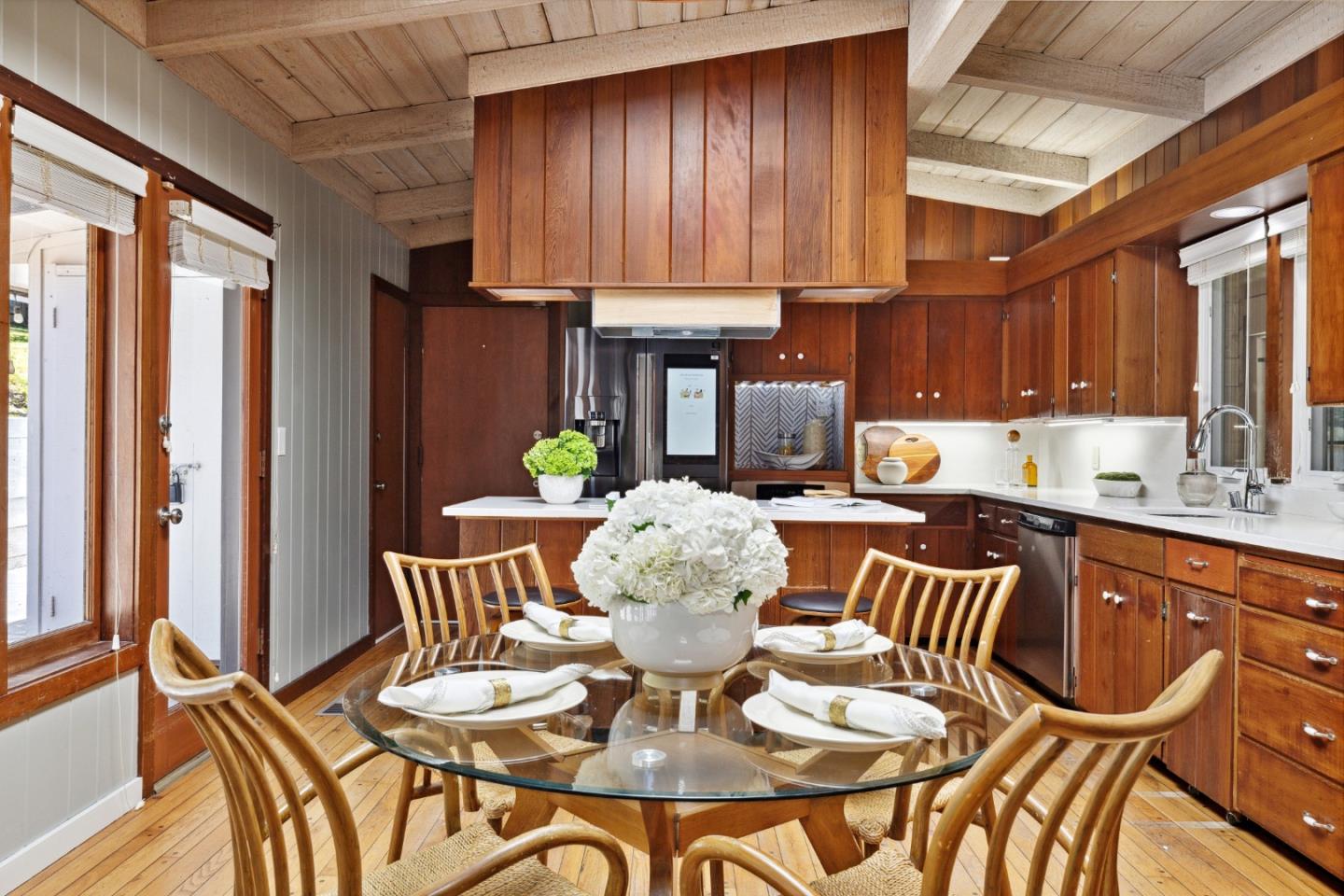 25165 Stewart Place Carmel, CA 93923 - Photo 14 of 51 a view of a dining room with furniture and kitchen view
