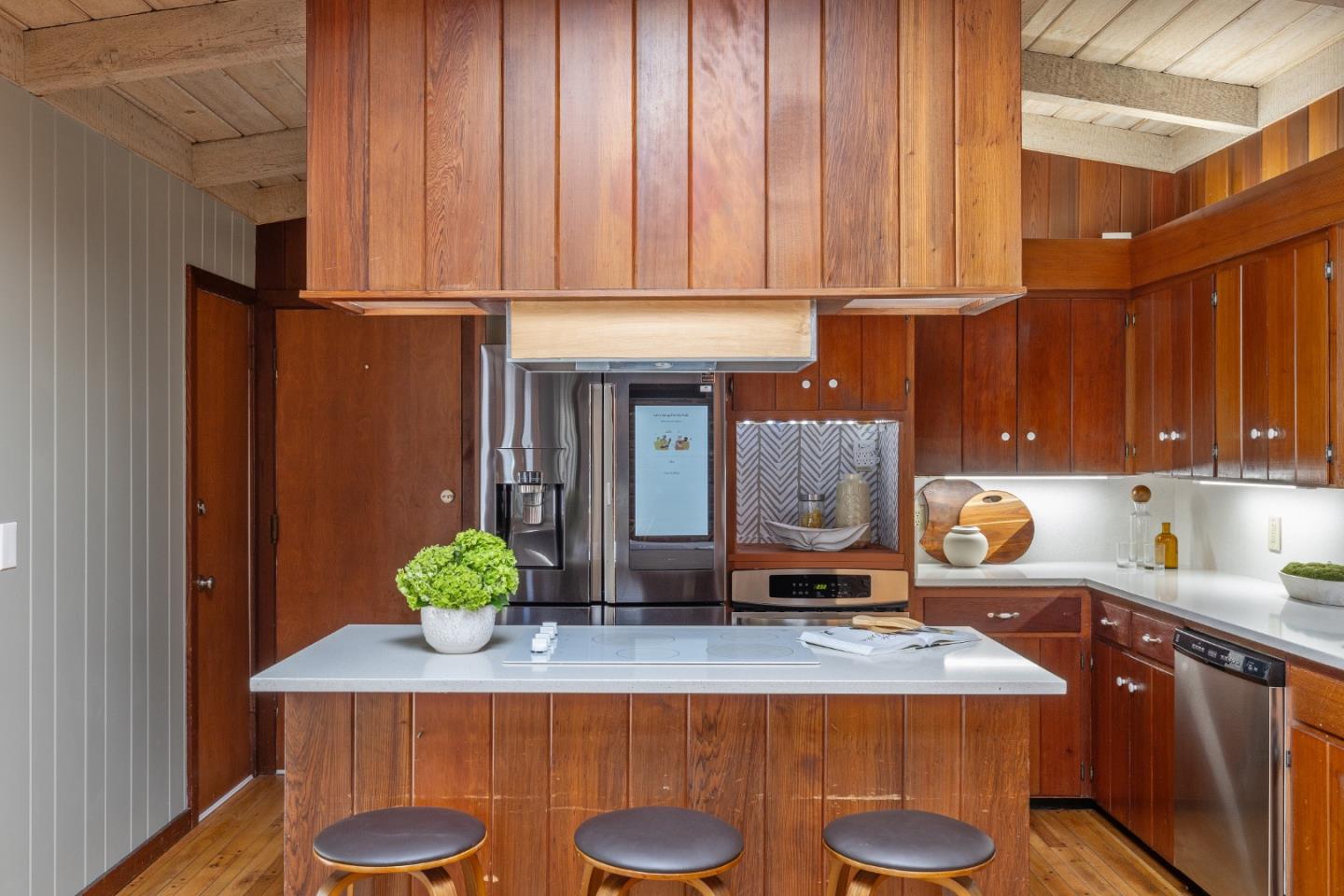 25165 Stewart Place Carmel, CA 93923 - Photo 15 of 51 a living room with furniture and a potted plant