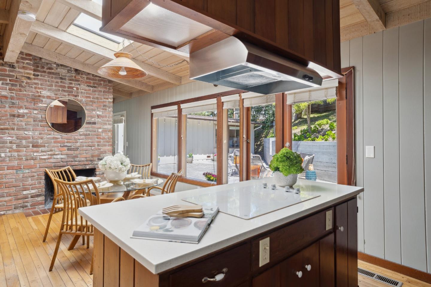 25165 Stewart Place Carmel, CA 93923 - Photo 17 of 51 a view of a dining table and chairs in the patio