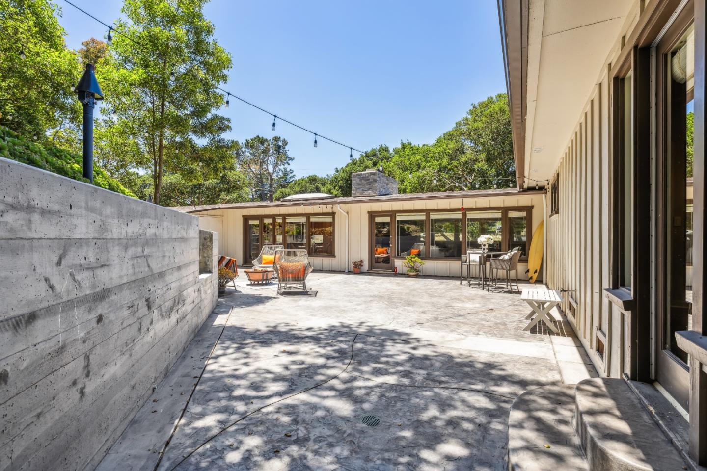 25165 Stewart Place Carmel, CA 93923 - Photo 20 of 51 a view of a house with backyard and sitting area