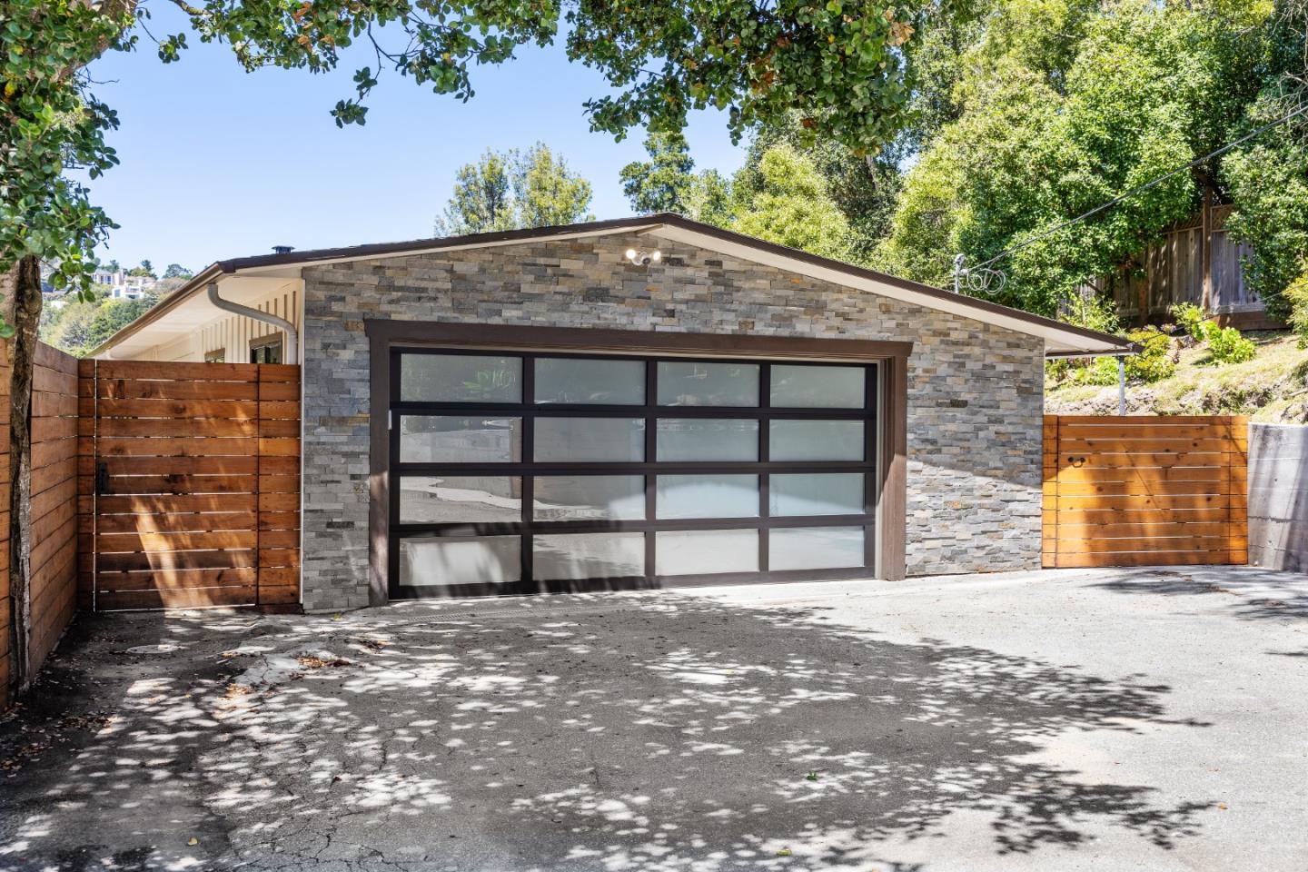 25165 Stewart Place Carmel, CA 93923 - Photo 2 of 51 a front view of a house with a yard