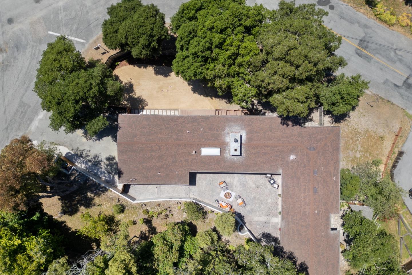 25165 Stewart Place Carmel, CA 93923 - Photo 50 of 51 an aerial view of house with yard and outdoor seating
