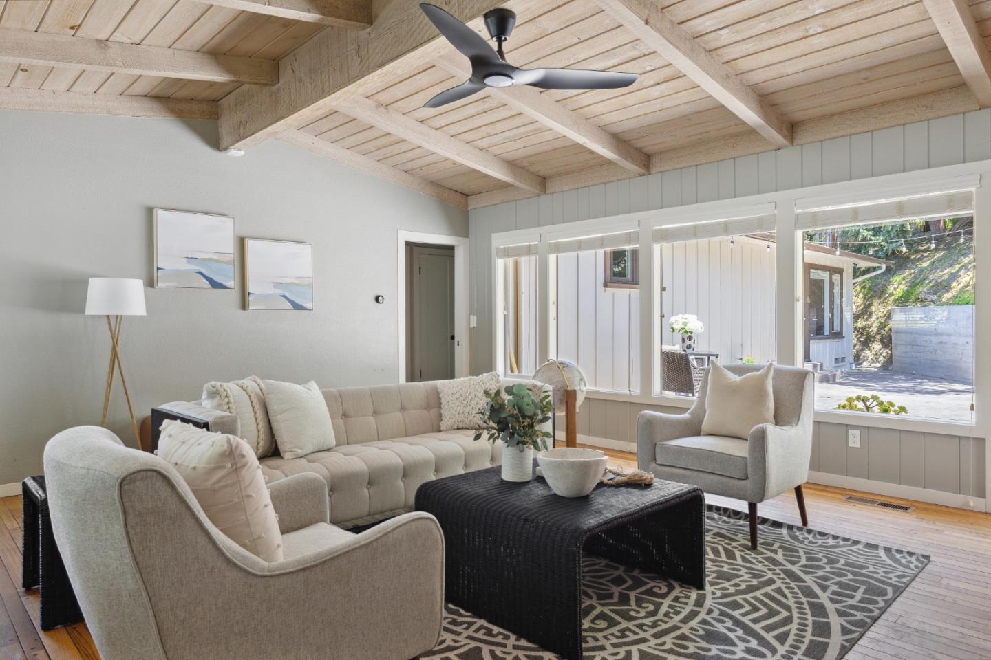 25165 Stewart Place Carmel, CA 93923 - Photo 7 of 51 a living room with furniture and wooden floor