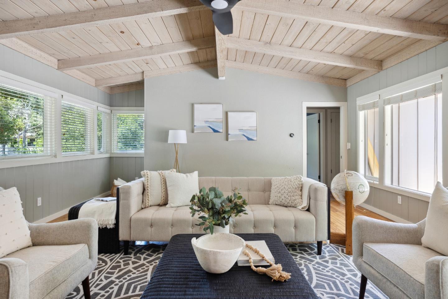 25165 Stewart Place Carmel, CA 93923 - Photo 8 of 51 a living room with furniture and a large window