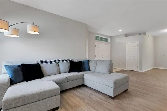 a view of a livingroom with furniture and an couch
