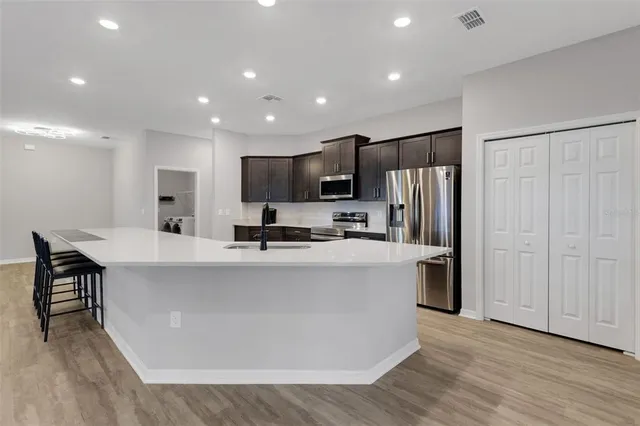 a view of kitchen with breakfast area