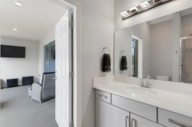 a view of a sink and table in the balcony