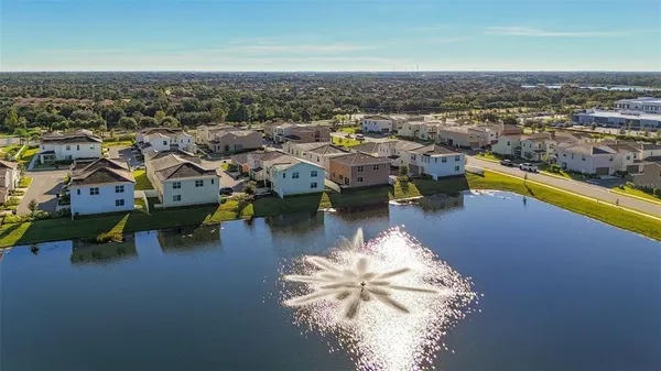 a view of a lake in middle of a city