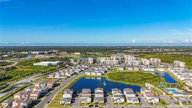 a view of a city with an ocean view