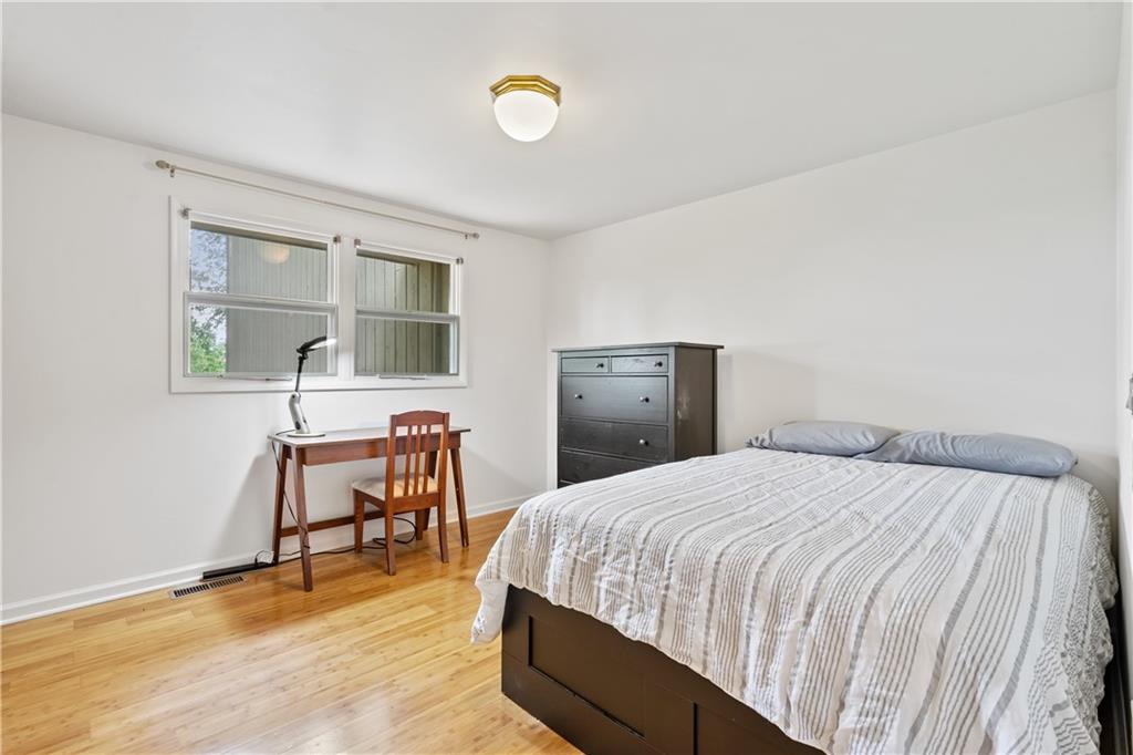 1318 Sky Ridge Drive Pittsburgh, PA 15241 - Photo 16 of 33 a bedroom with a bed and a table