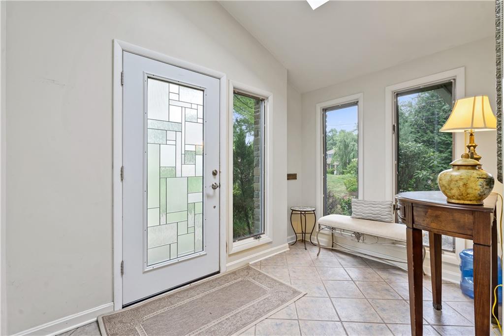 1318 Sky Ridge Drive Pittsburgh, PA 15241 - Photo 3 of 33 a living room with furniture a window and a table