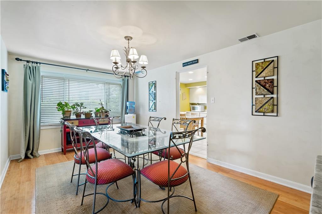 1318 Sky Ridge Drive Pittsburgh, PA 15241 - Photo 9 of 33 a view of a dining room with furniture and chandelier
