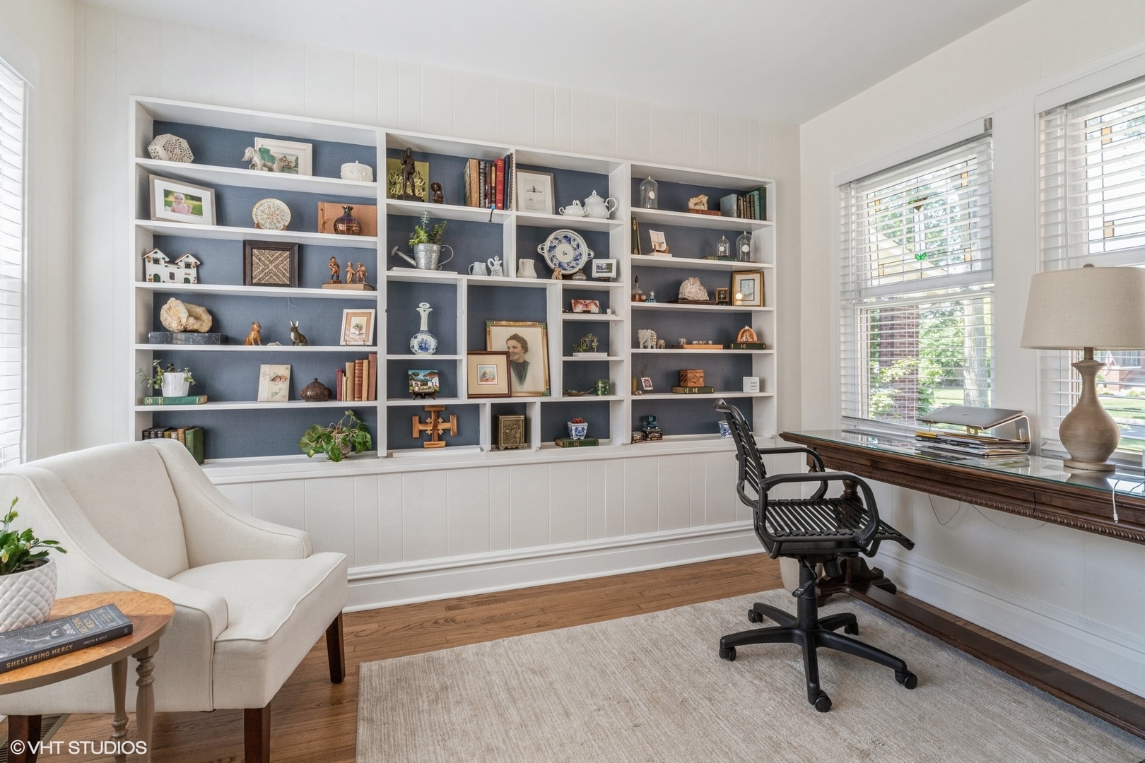 613 South Prospect Avenue Park Ridge, IL 60068 - Photo 11 of 29 a view of a workspace with a window and a bookshelf