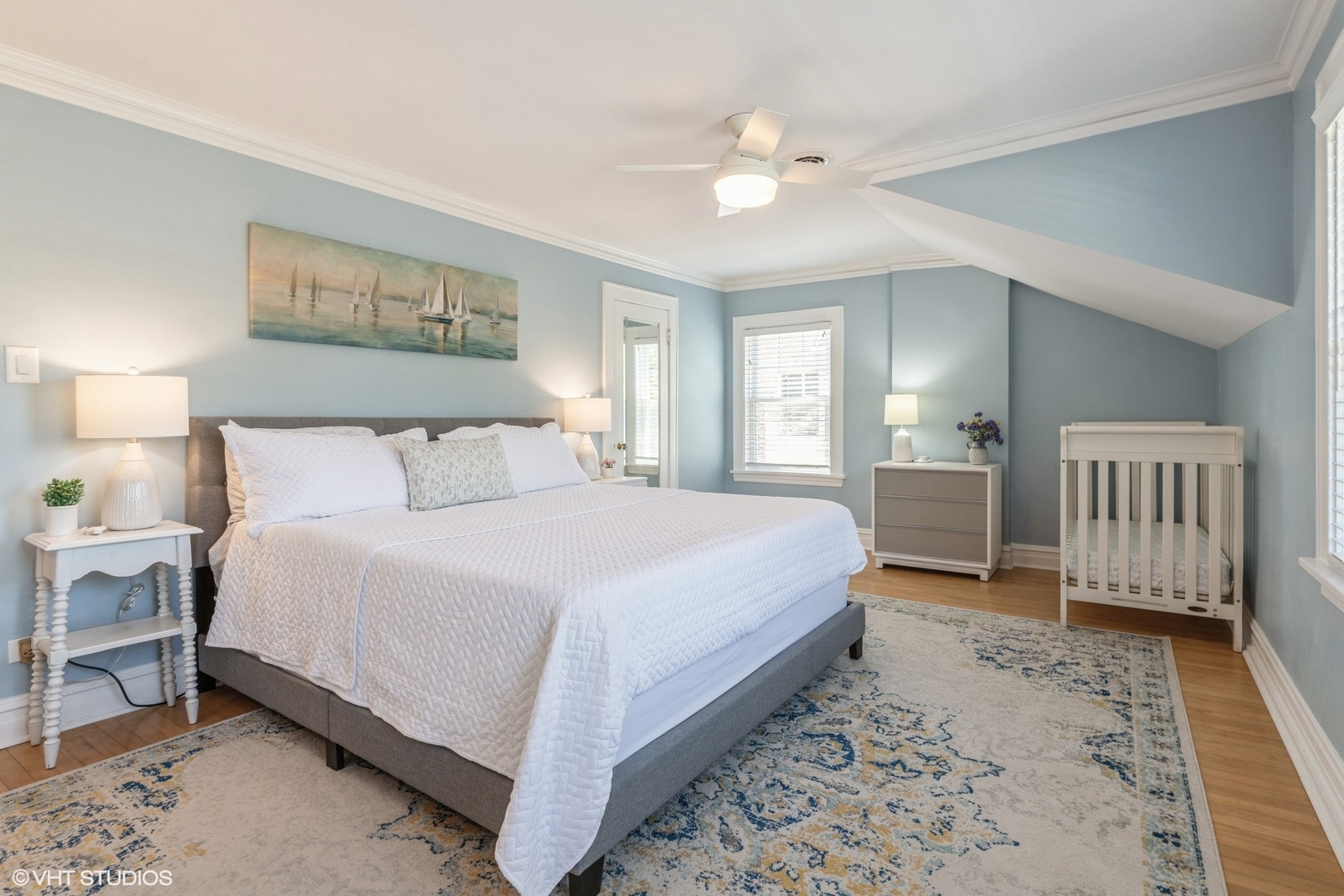 613 South Prospect Avenue Park Ridge, IL 60068 - Photo 15 of 29 a bedroom with a bed and a chandelier