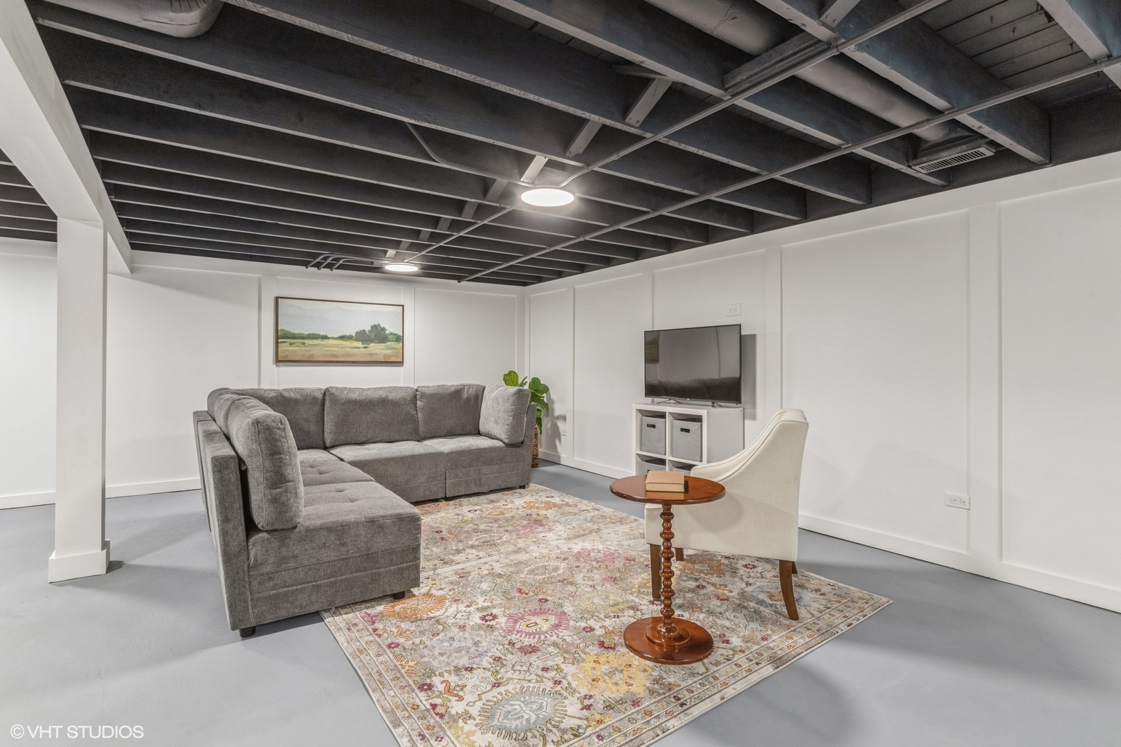 613 South Prospect Avenue Park Ridge, IL 60068 - Photo 21 of 29 a living room with furniture and a flat screen tv