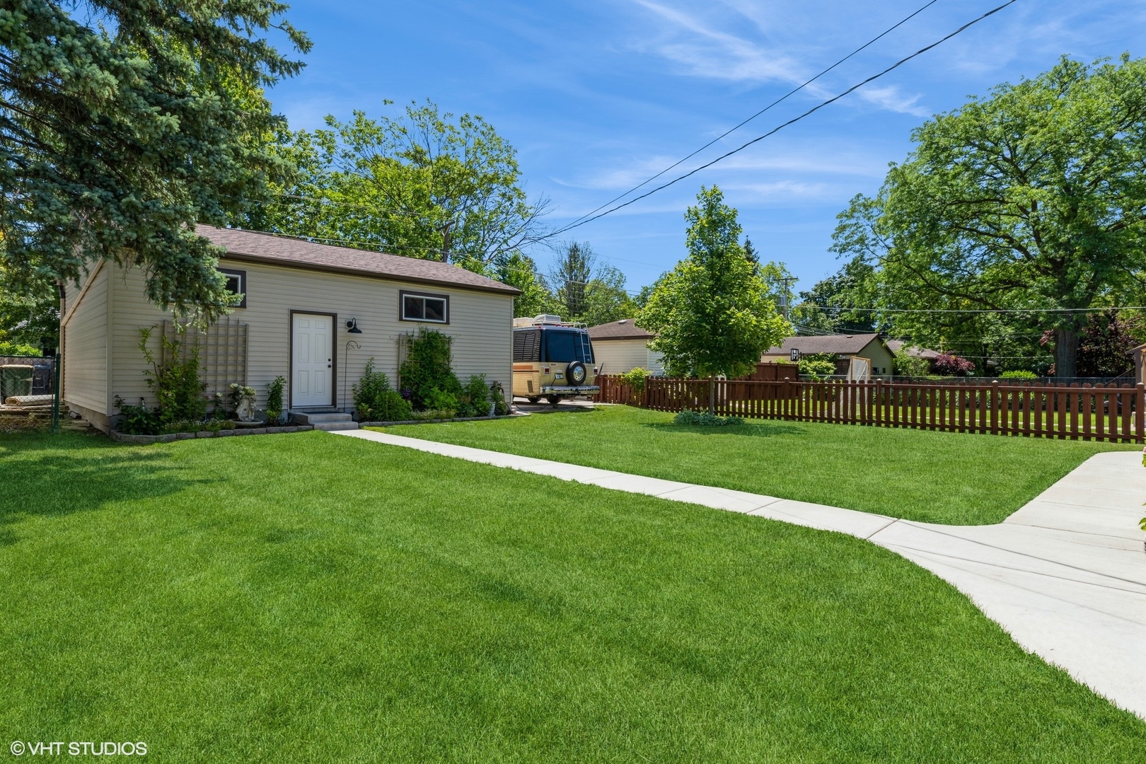 613 South Prospect Avenue Park Ridge, IL 60068 - Photo 24 of 29 a view of a house with a big yard and potted plants