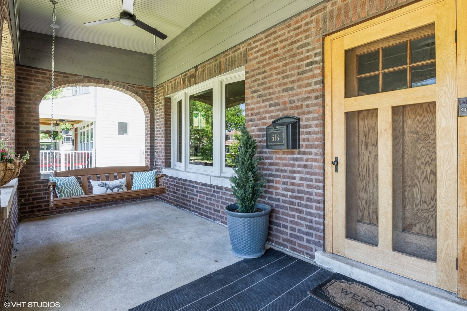613 South Prospect Avenue Park Ridge, IL 60068 - Photo 3 of 29 a view of a porch with chairs and potted plants